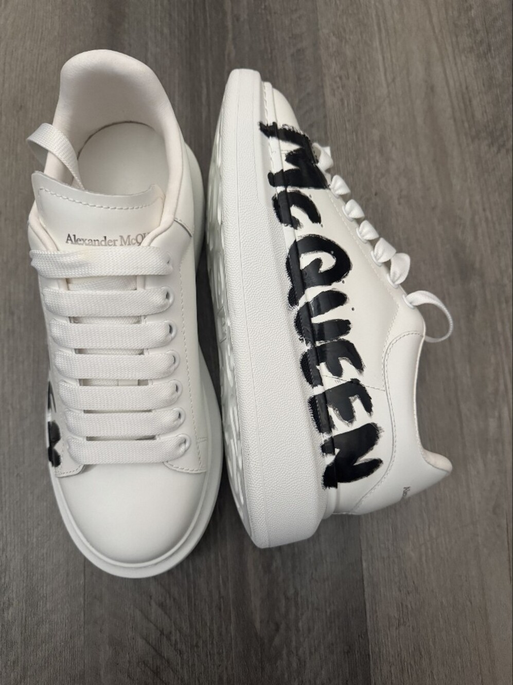 Alexander McQueen White Leather Sneakers with Black Painted Logo